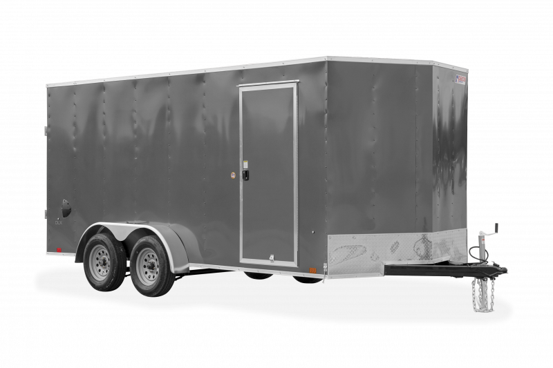 Pace American | Trailers | Trailer Models | Outback DLX | Image of grey enclosed cargo trailer with dual axles showing right front side of trailer and a clear background | Image 7